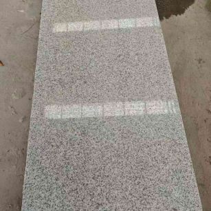 运城芝麻白光面毛板