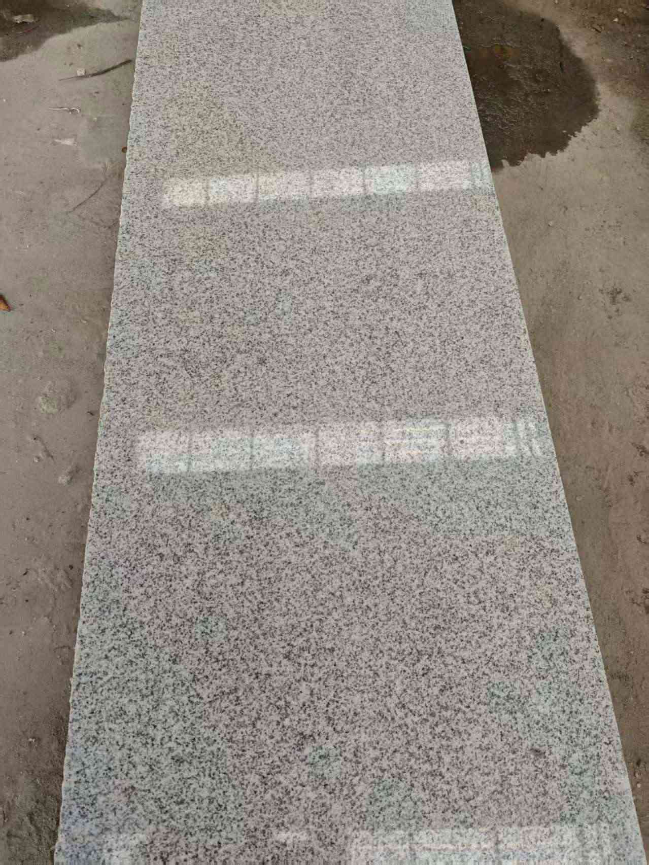 运城芝麻白光面毛板